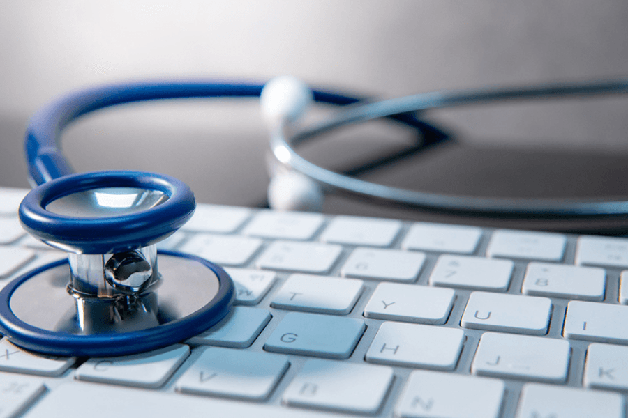 stethoscope on keyboard to Cloud ERP for healthcare represent
